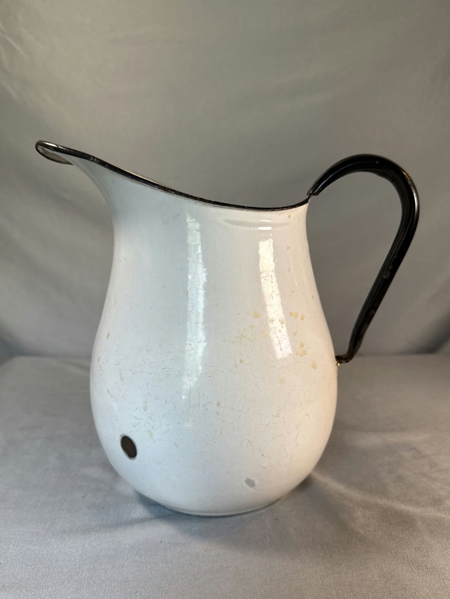 Antique White Enamelware Water Pitcher with Black Rim