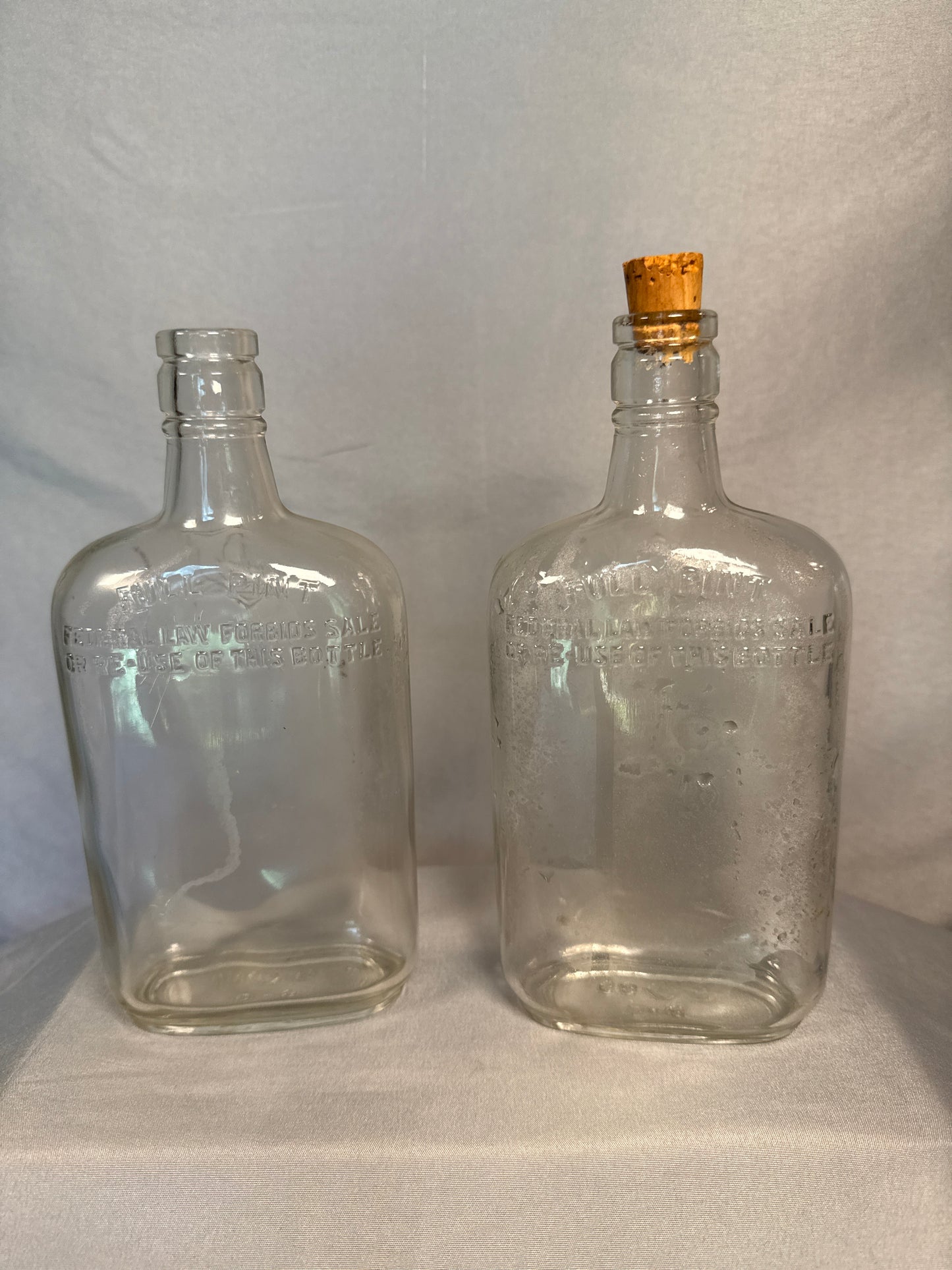 Pair Vintage Post-Prohibition Glass Liquor Flasks Federal Warning Bottles
